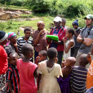 EKU Master of Public Health student Ben Cheruiyot, survey in hand, is surrounded